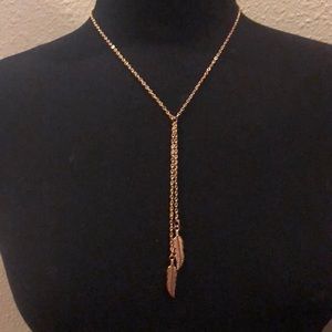 gold chain necklace with feather charms